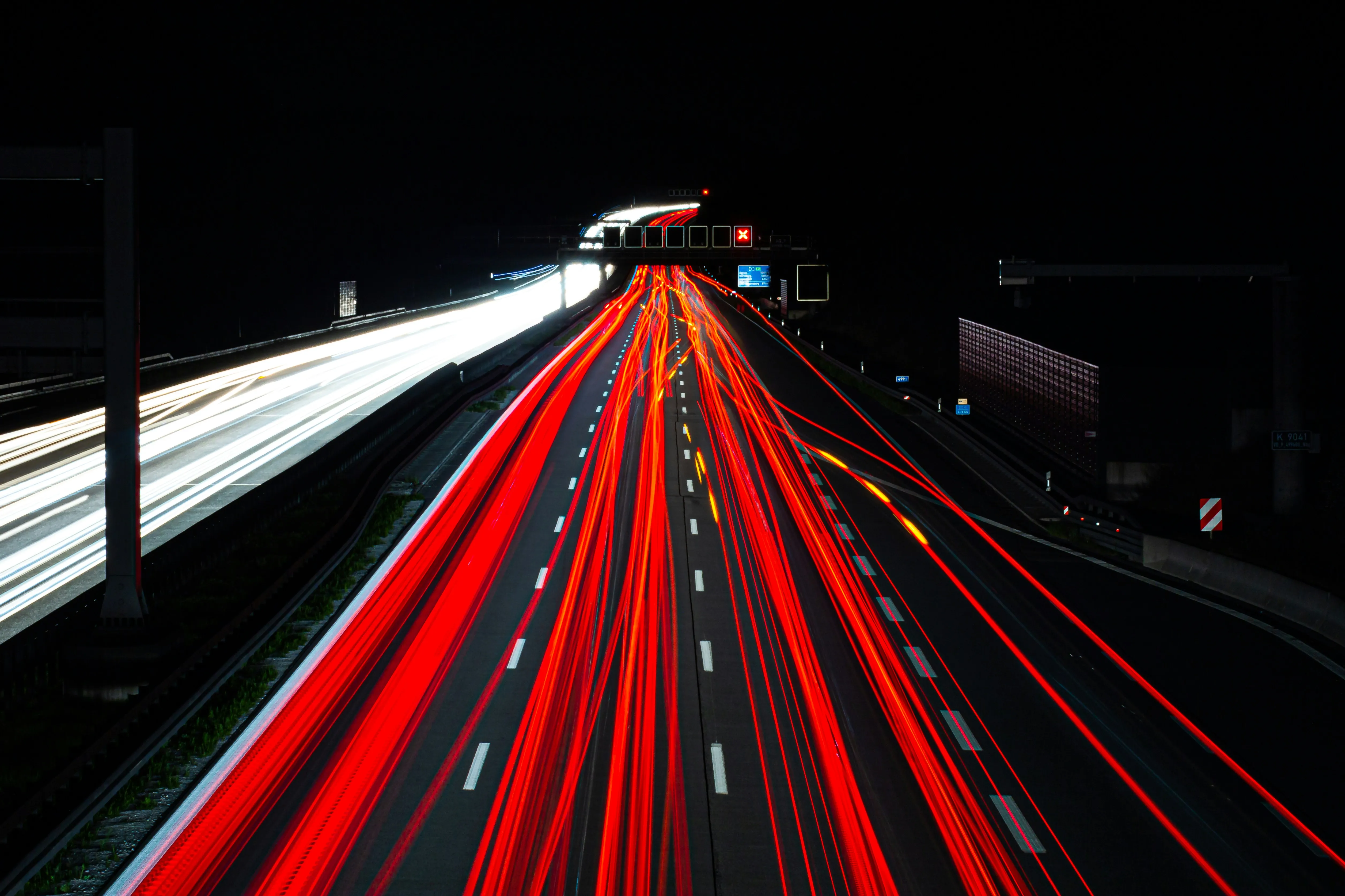 Light trails highway by Emily Rusch on Unsplash